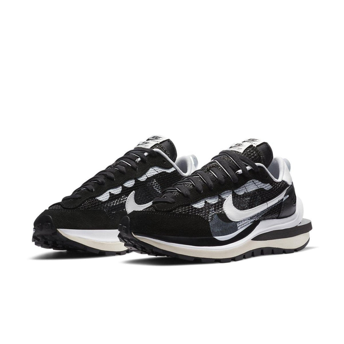 Nike VaporWaffle sacai Black White sneaker featuring a modern design with classic elements and Waffle outsole.