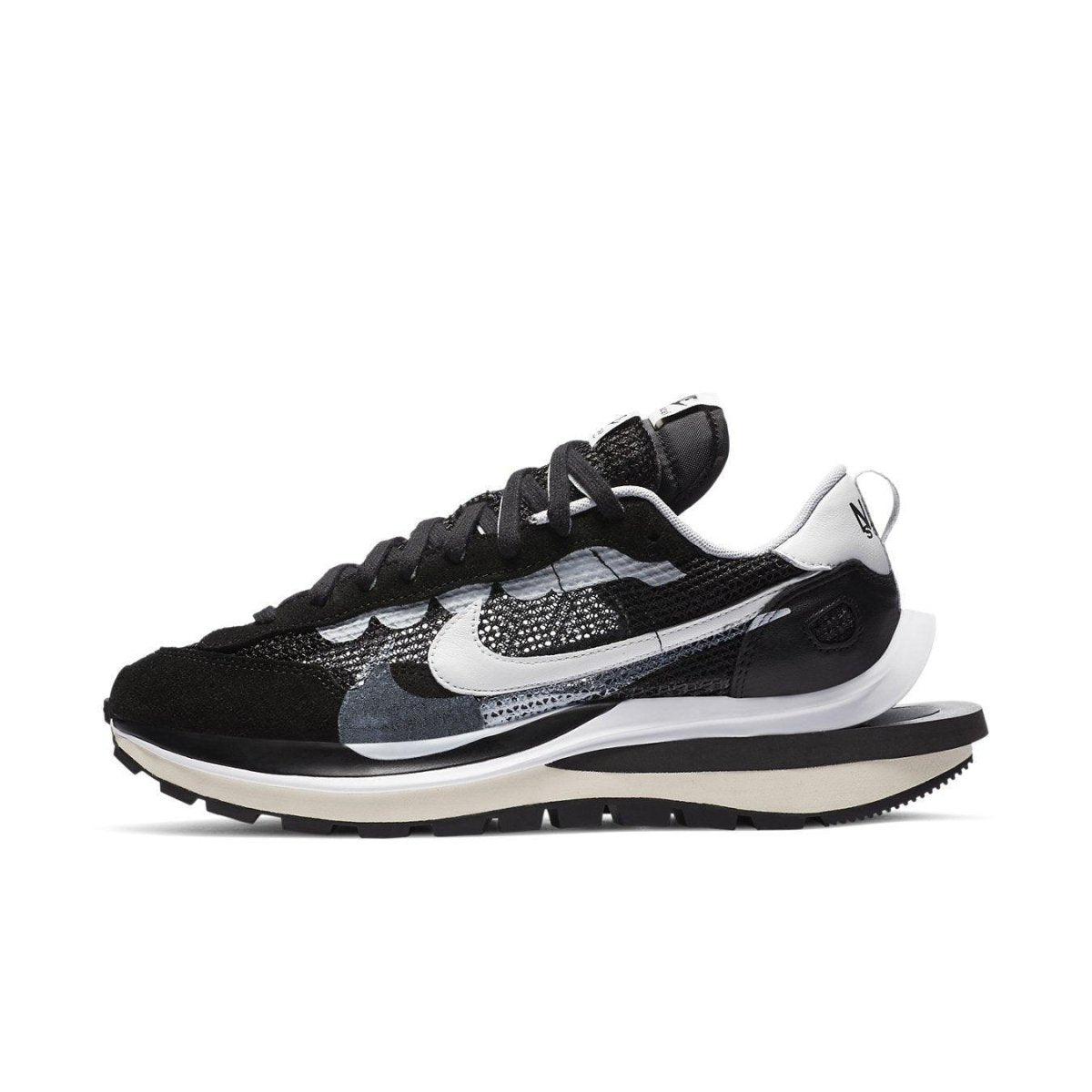 Nike Vaporwaffle Sacai in black and white, blending modern design with retro running features.