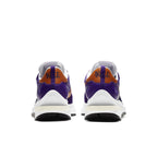 Nike VaporWaffle sacai Dark Iris back view showcasing purple nylon upper with orange accents and modern retro silhouette.