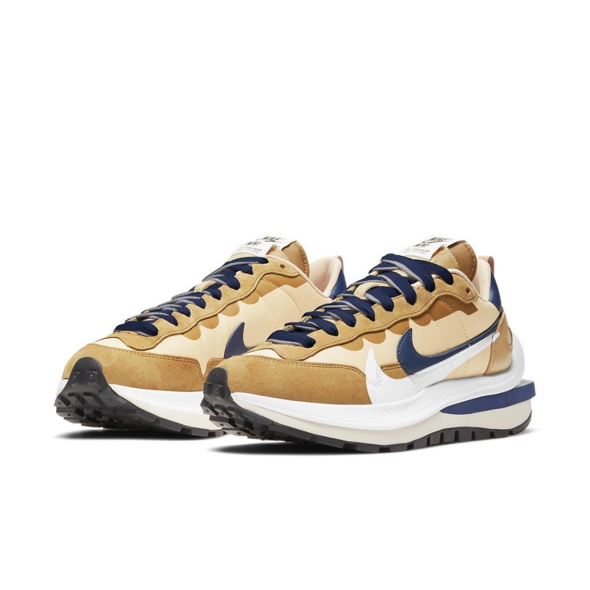 Nike Vaporwaffle sacai Sesame Blue Void sneakers featuring a blend of modern and classic design elements.