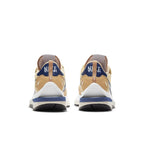 Nike VaporWaffle sacai Sesame Blue Void shoes rear view with distinctive Waffle outsole and unique colorway.