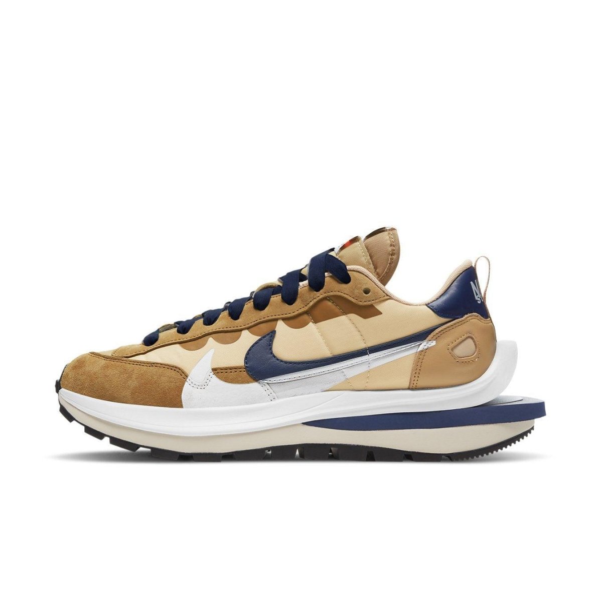 Nike x sacai VaporWaffle in Sesame Blue Void, blending vintage style and modern performance.