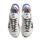 Nike x sacai VaporWaffle Sport Fuchsia Game Royal sneakers with iconic Waffle sole and modern design.