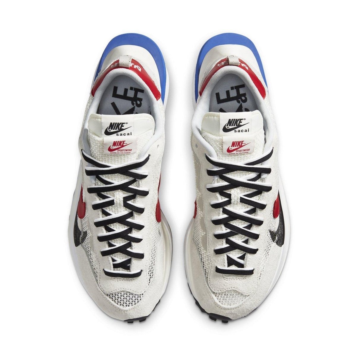 Nike x sacai VaporWaffle Sport Fuchsia Game Royal sneakers with iconic Waffle sole and modern design.