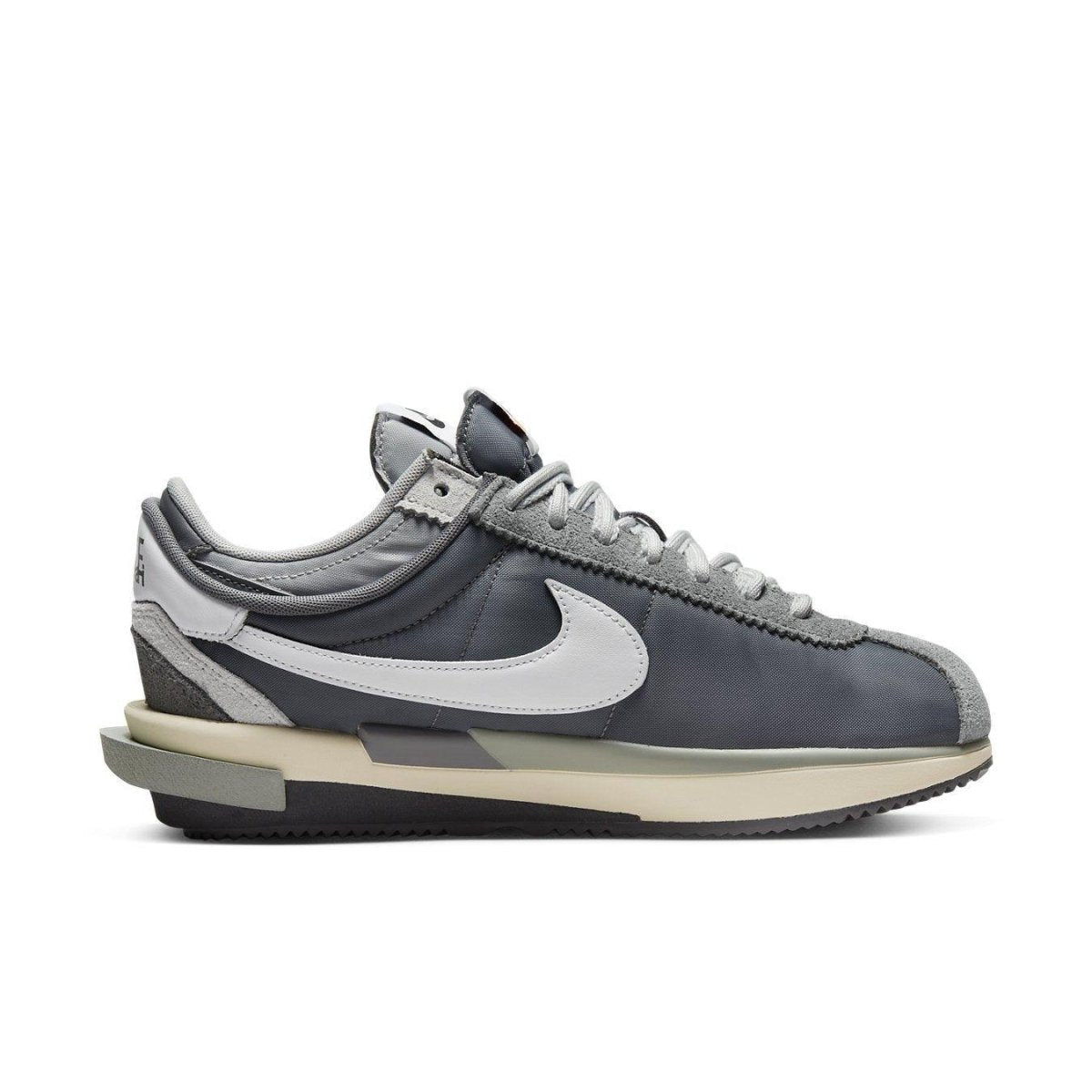 Nike Zoom Cortez SP sacai Iron Grey sneaker featuring layered design and neutral color palette.