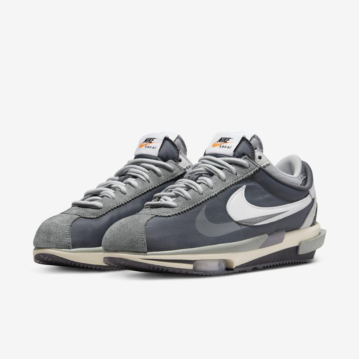 Nike Zoom Cortez SP sacai 'Iron Grey' shoe featuring layered grey nylon and suede design.