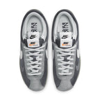 Nike Zoom Cortez SP sacai Iron Grey top view showcasing grey nylon and suede details.