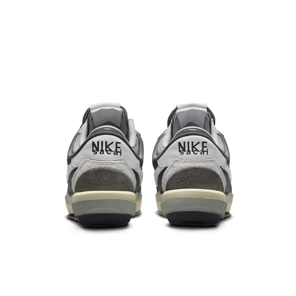 Nike Zoom Cortez SP sacai 'Iron Grey' sneakers featuring a layered design and neutral color palette from the back.