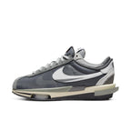 Nike Zoom Cortez SP sacai Iron Grey sneaker showcasing layered design and neutral tones.