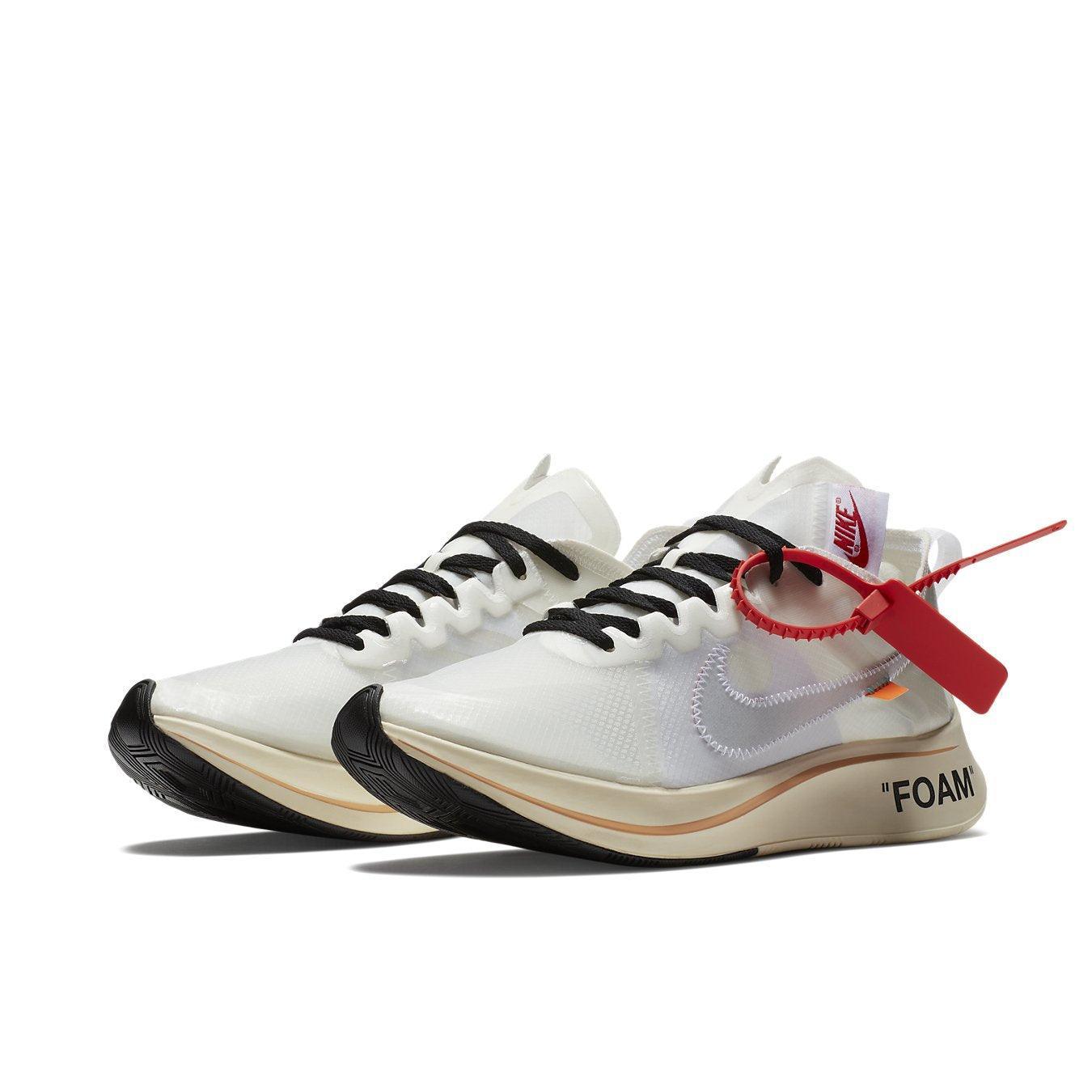 Nike Zoom Fly Off-White sneakers featuring white upper, black accents, and red zip tie detail.