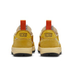 NikeCraft General Purpose Shoe Tom Sachs in Dark Sulfur, featuring yellow suede and red accents from the back view.