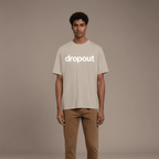 Model wearing oversized Dropout tee in soft cotton, showcasing bold logo, perfect blend of style and comfort.