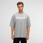 Grey oversized tee featuring bold 'dropout' logo for effortless style and comfort in soft cotton.